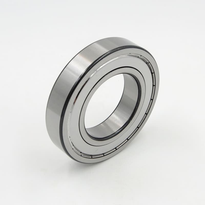 Exploded view diagram of a deep groove ball bearing showing its four main parts