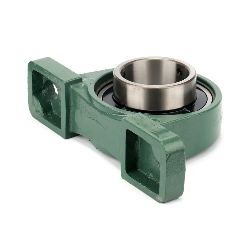 Technician using a laser alignment tool on a motor and pump connected by a coupling