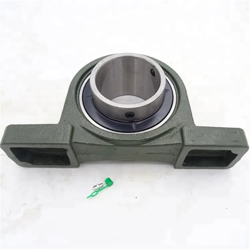 Pillow block bearing on agricultural machinery in dusty field