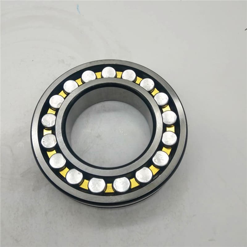 Engineer taking vibration readings on a spherical roller bearing housing