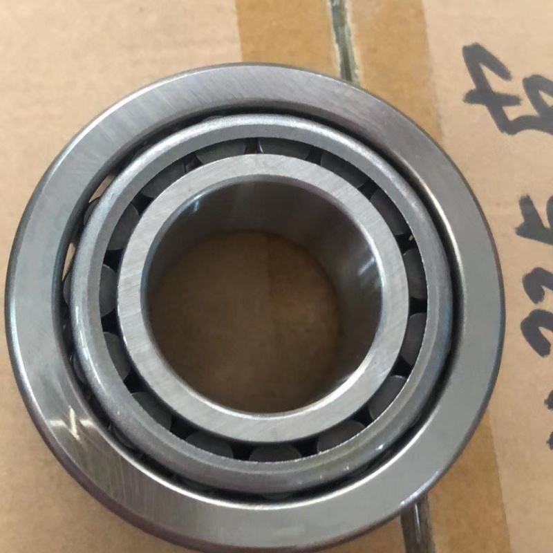 Tapered roller bearing under high load in industrial gearbox